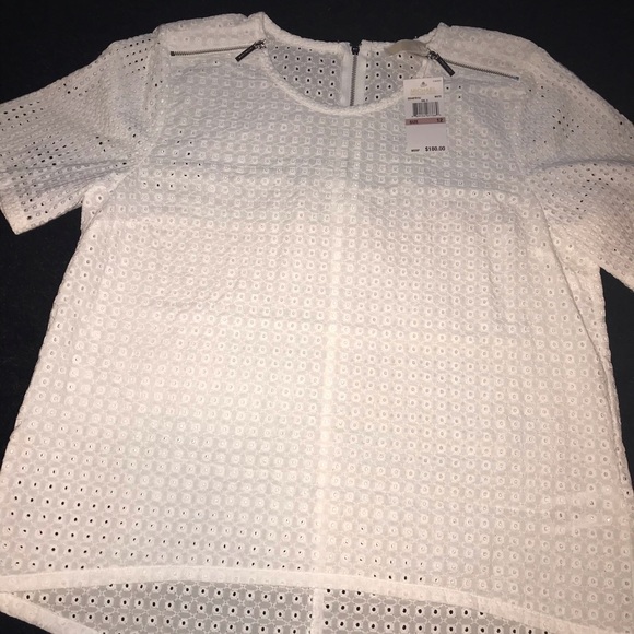 Michael Kors Tops - Beautiful brand new MK blouse/ Longer  in back/NWT